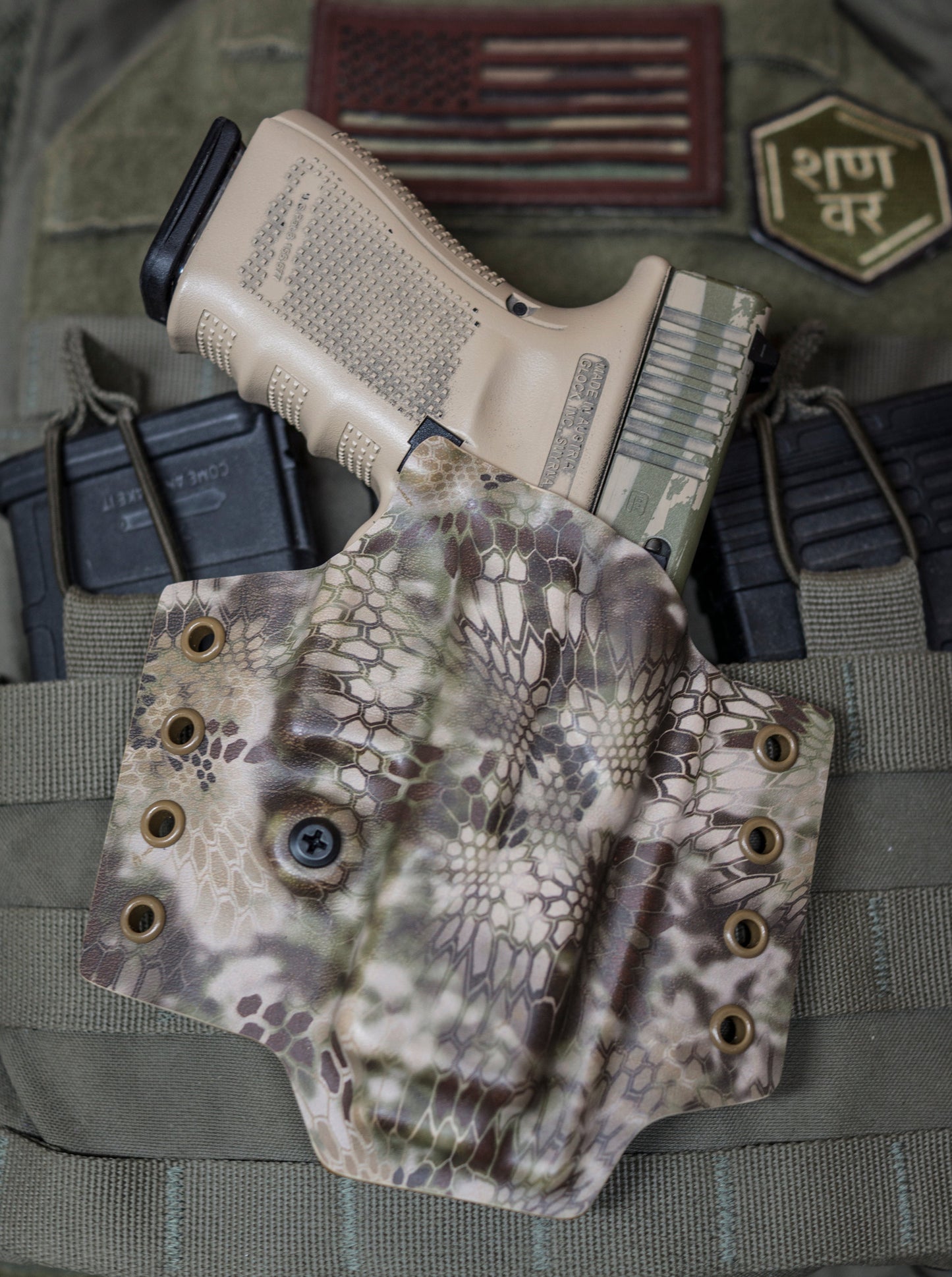 OWB Non-Light Bearing Kydex Holster for a Glock 19 in Kryptek Highlander infused Kydex.