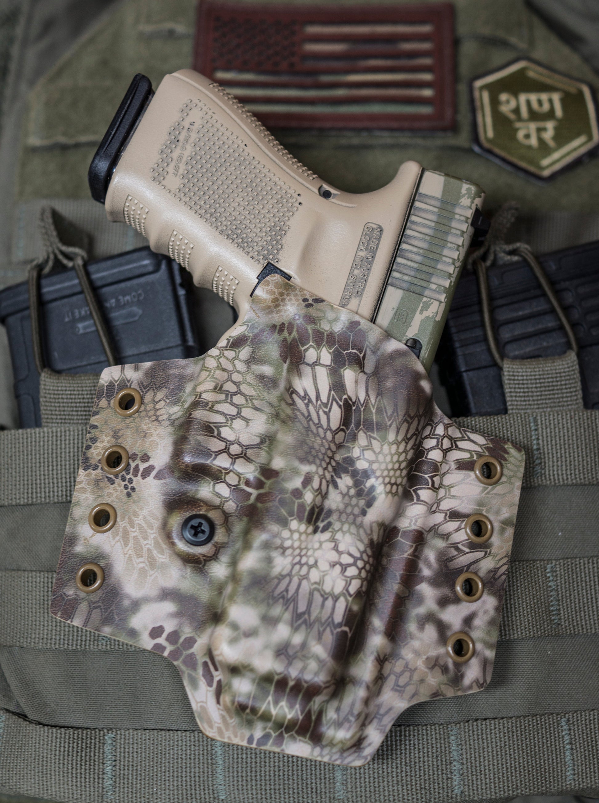 OWB Non-Light Bearing Kydex Holster for a Glock 19 in Kryptek Highlander infused Kydex.
