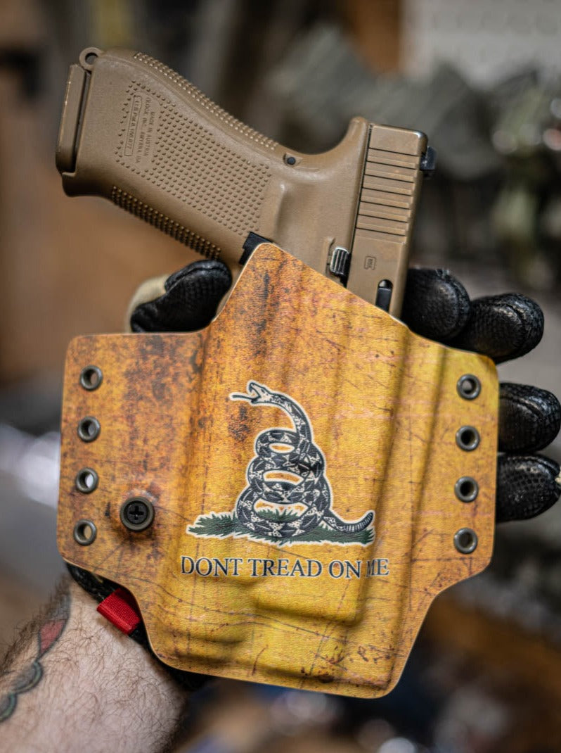 Outside the Waistband Kydex light bearing holster for a Glock 19 with TLR-1. DTOM print.