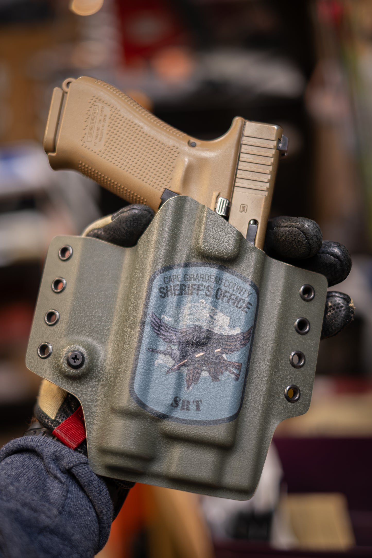 Custom Outside the Waistband Kydex holster Glock 17 with Streamlight TLR-1.