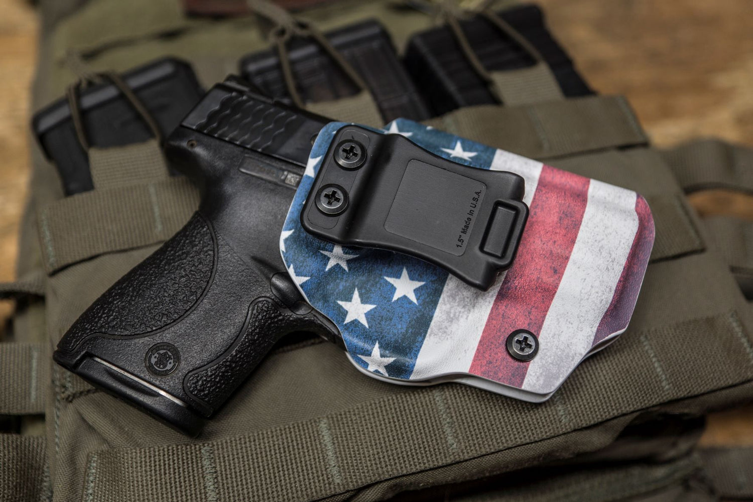 Inside the Waistband Kydex Holster for a Smith and Wesson M&P Shield.  Shown here in red white and blue American flag.