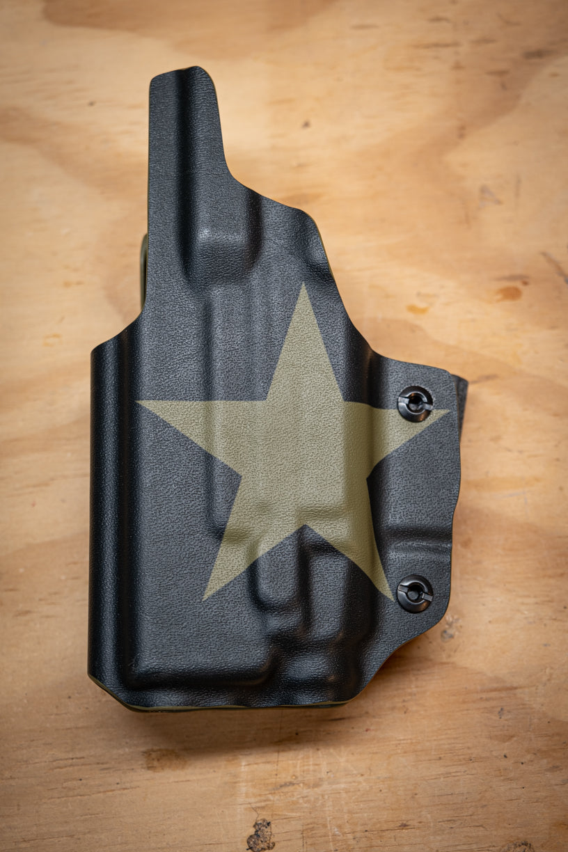 IWB Inside the Waistband Glock 19 with Streamlight TLR-7 light bearing kydex Holster wrapped in OD Green Texas flag showing the side with the Lone Star