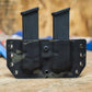Double Magazine Carrier for Glock in Multicam Black fabric.
