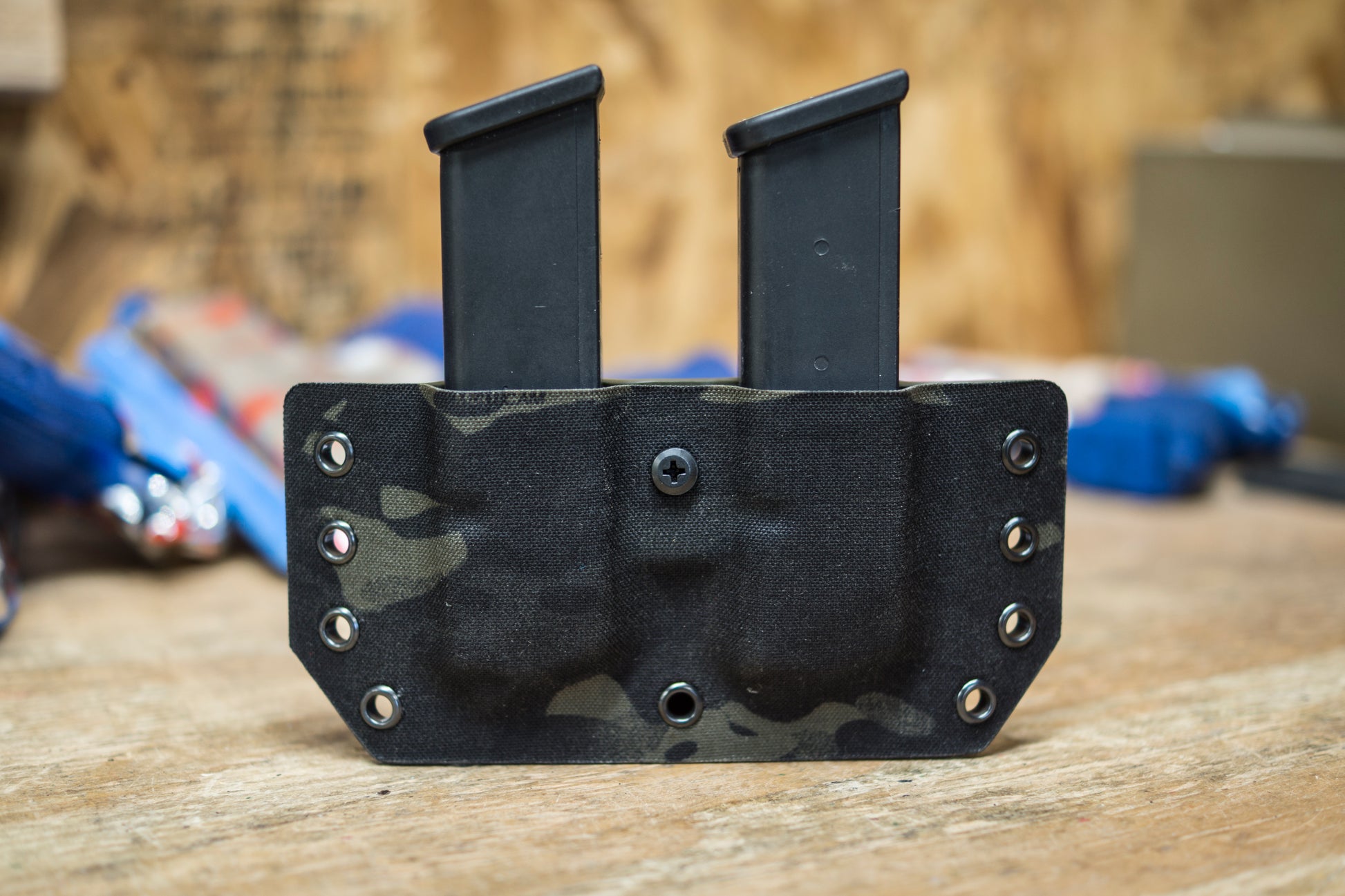 Double Magazine Carrier for Glock in Multicam Black fabric.