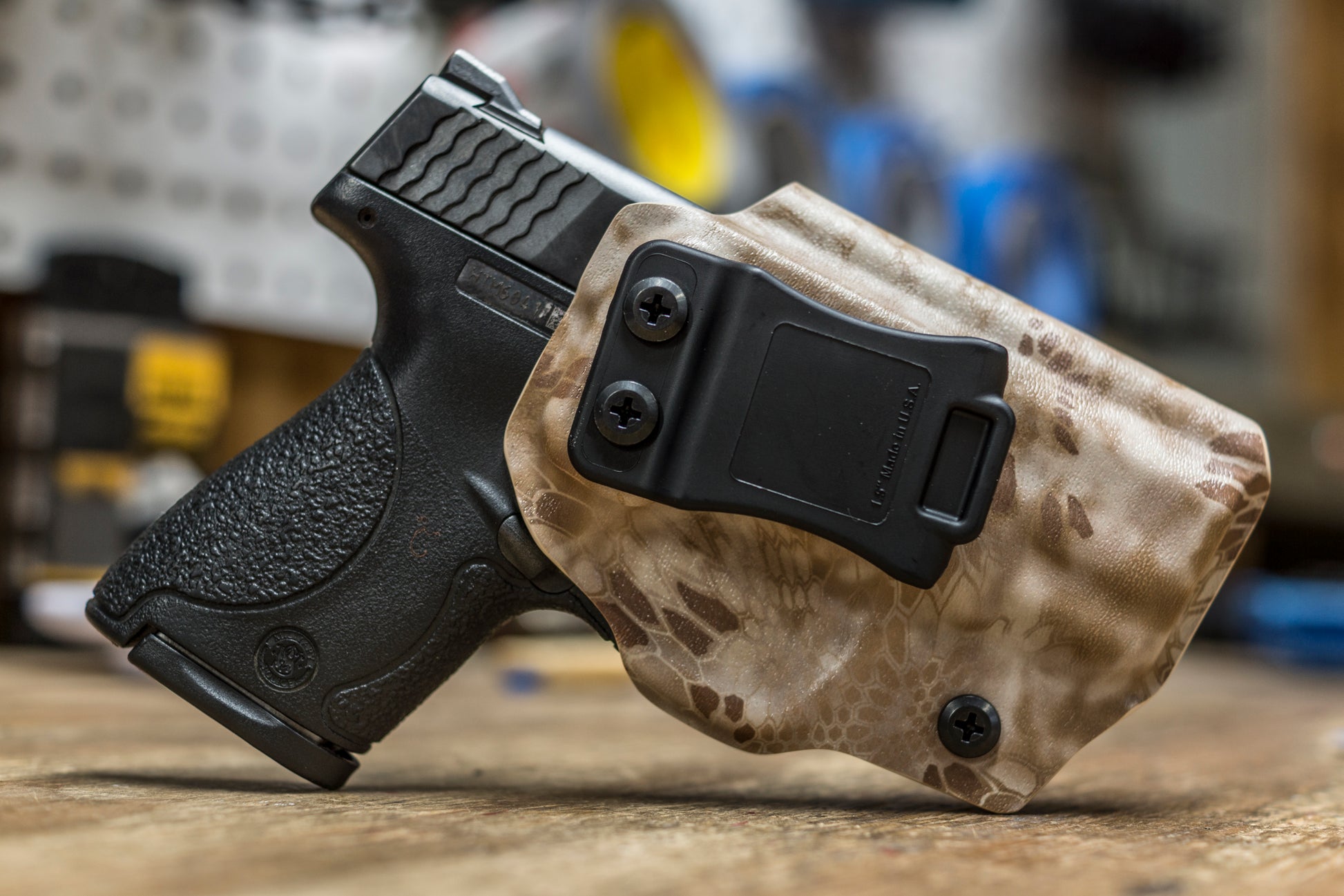 IWB Holster for a S&W M&P Shield in Kryptek Nomad infused kydex.