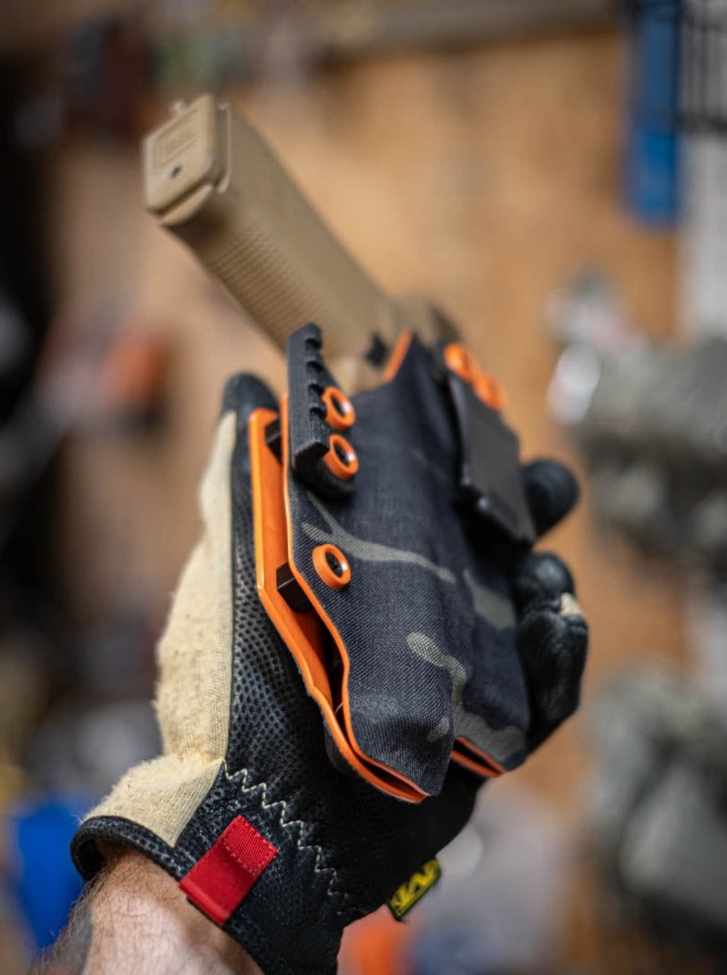 IWB Light Bearing Kydex holster covered in Multicam Black. Showing two-tone colors.