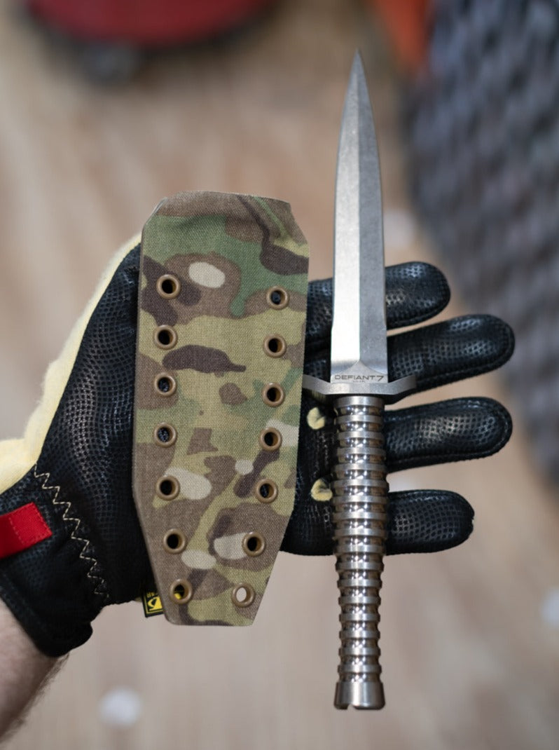 Kydex knife sheath covered in Multicam Original Kydex for a Defiant 7 dagger.