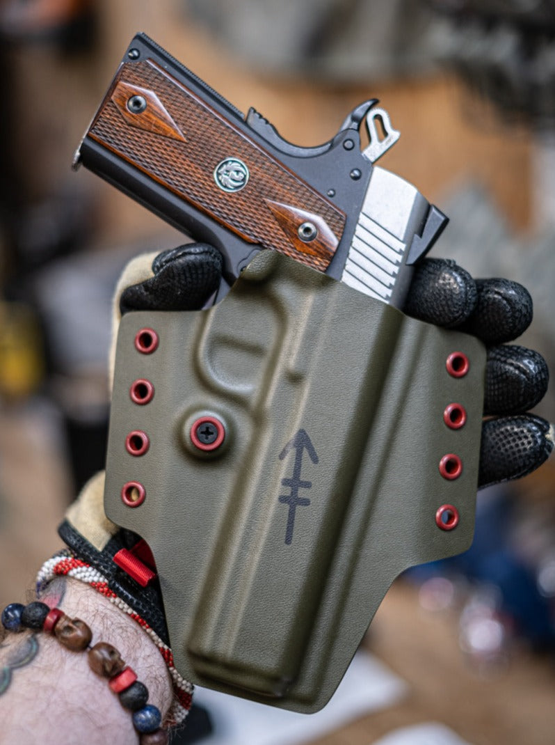 Outside the Waistband Kydex holster for a 1911.  Custom print for a veteran of the Army.