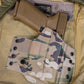 Multicam Original Infused Kydex on a Light Bearing OWB Holster for a Glock 19 with an Olight  Baldr Mini