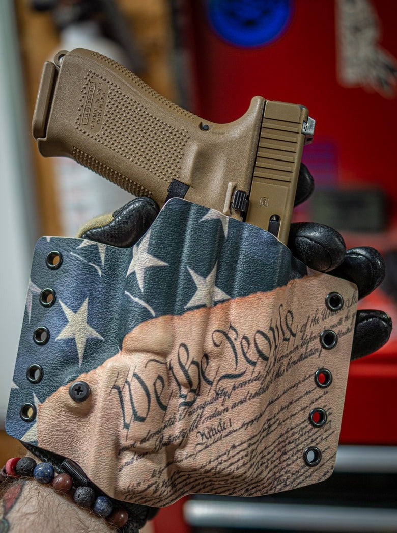 OWB Light Bearing Kydex Holster in We The People Infused Kydex for a Glock 19 G19 with an Olight PL-Pro